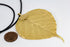 products/SA0200100121201-Necklaces-WholePieceLeaves-SGold-L-FicusReligiosaLeaf-BlackLeatherCordS-07.jpg