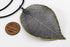 products/SA0200100420101-Necklaces-WholePieceLeaves-SBlack-L-KingKongLeaf-BlackLeatherCordS-01.jpg