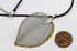 products/SA0200100520101-Necklaces-WholePieceLeaves-SSilver-L-KingKongLeaf-BlackLeatherCordS-01.jpg