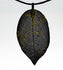 products/SA0200314320101-Necklaces-WholePieceLeaves-GoldLineBlack-L-KingKongLeaf-BlackLeatherCordS-00.jpg