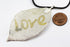 products/SA0200315120101-Necklaces-WholePieceLeaves-LoveWordWhite-L-KingKongLeaf-BlackLeatherCordS-01.jpg